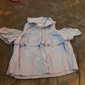 blue shirt with open shoulders